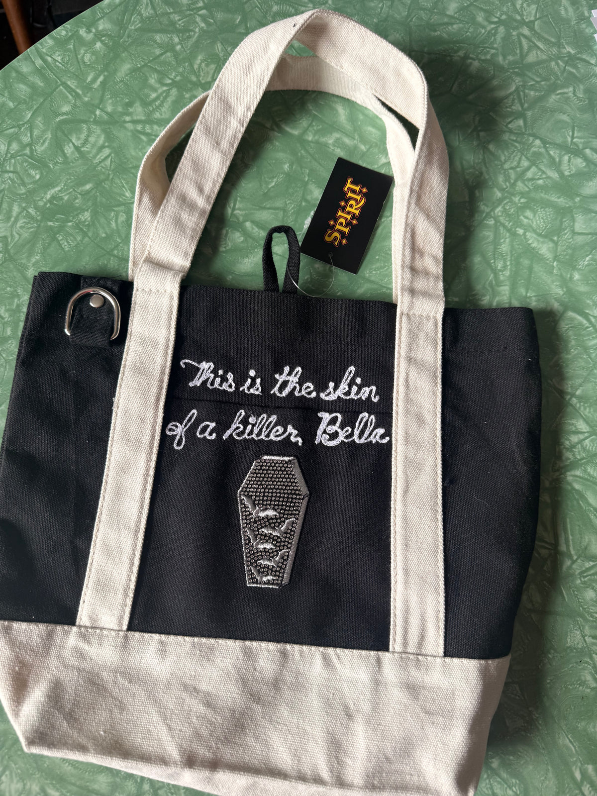 This is the skin of a killer, Bella Glitter Coffin Mini-Tote