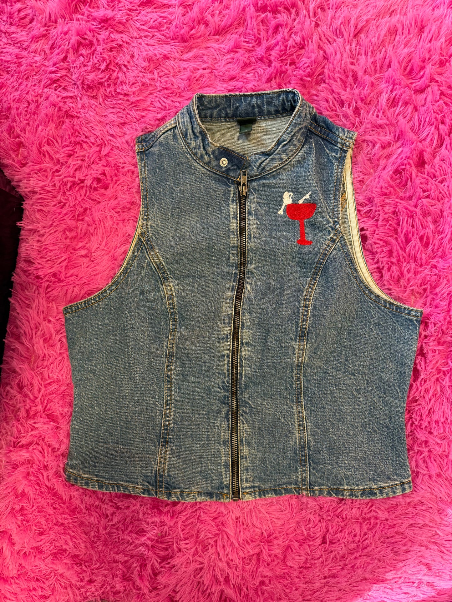 Coupe Woman on Sleeveless Denim Moto Vest