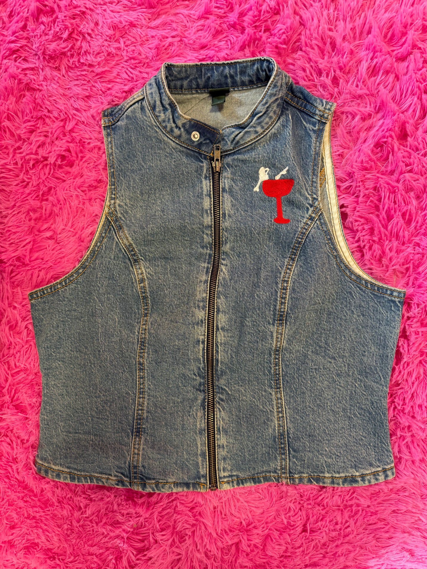Coupe Woman on Sleeveless Denim Moto Vest