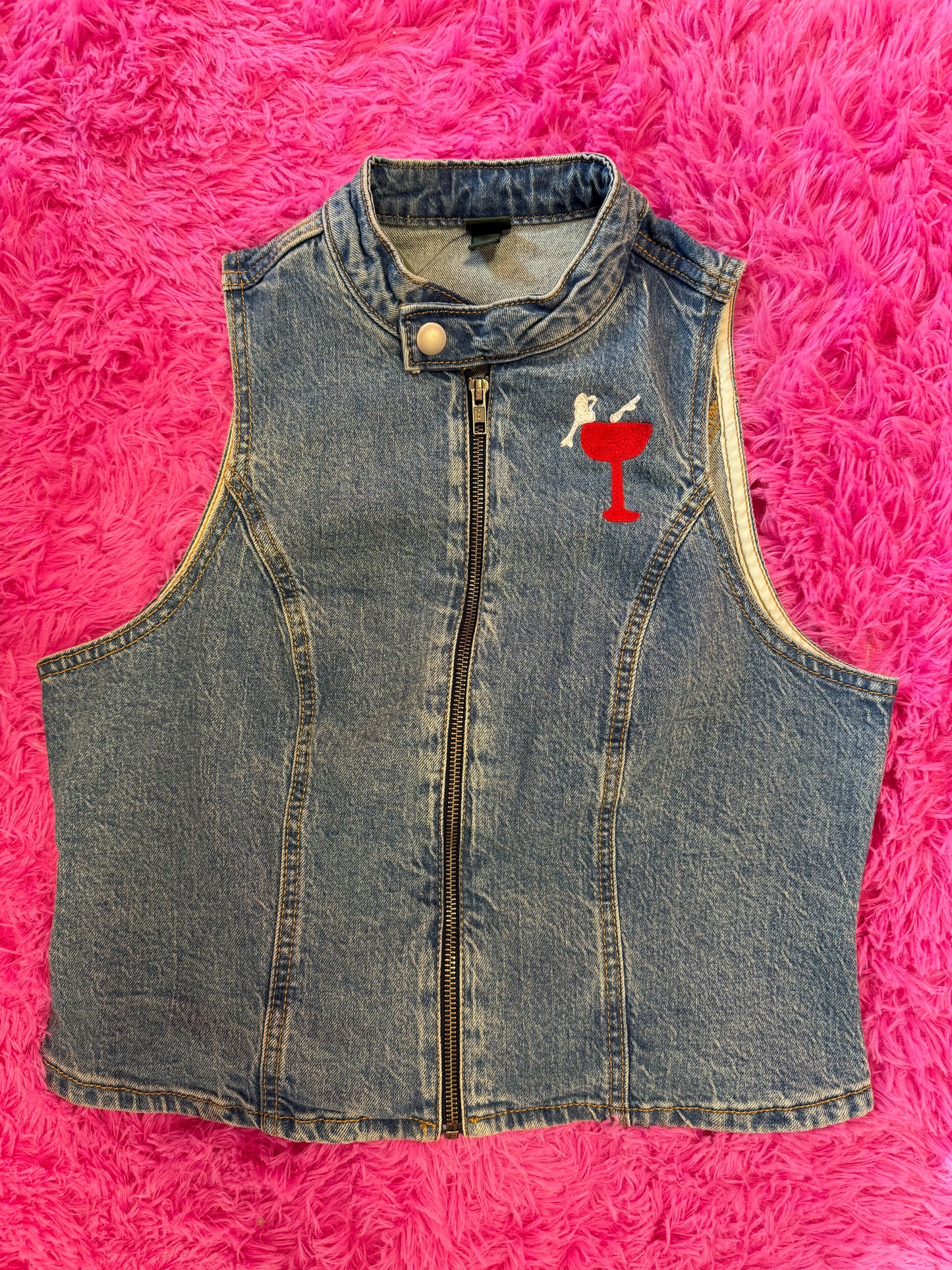 Coupe Woman on Sleeveless Denim Moto Vest